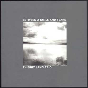 Thierry Lang - Between A Smile And Tears